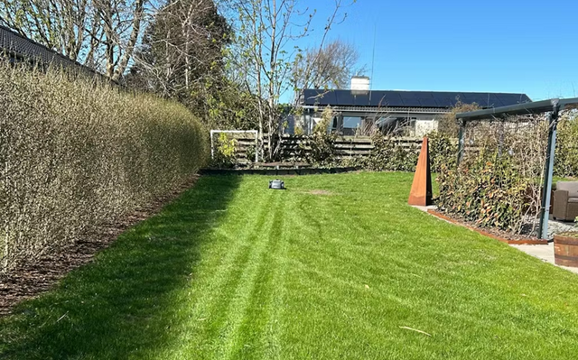 Clean Sheet Season robot mower scene